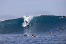 Brett Wood on a set wave at a remote break in the Mentawai Islands, Sumatra, Indonesia.