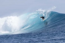 Brett Wood on a set wave at a remote break in the Mentawai Islands, Sumatra, Indonesia.