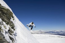 Rewa Morrison making the most of the terrain at Soho, at Cardrona ski field, Cardrona Valley, Wanaka, New Zealand.