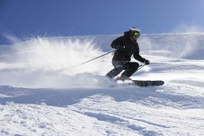 Kenny Mutton enjoying a sunny day at Treble Cone ski field, Wanaka, New Zealand.