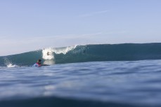 Keo Morrison makes the most of a magic run of swell continues at dawn at a remote lefthand reefbreak in the Mentawai Islands, Sumatra, Indonesia.