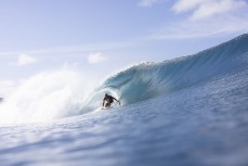 Dave Lyons enjoys a magic run of swell at dawn at a remote lefthand reefbreak in the Mentawai Islands, Sumatra, Indonesia.