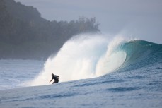 Dave Lyons charging a remote reefbreak in the Mentawai Islands, Sumatra, Indonesia.