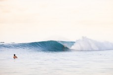 George Roberts gets barreled at a popular reefbreak in the Mentawai Islands, Sumatra, Indonesia.