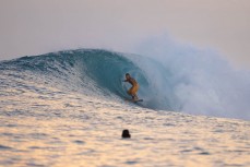 George Roberts gets barreled at a popular reefbreak in the Mentawai Islands, Sumatra, Indonesia.