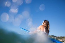 Ruby Muir paddles out at St Clair, Dunedin, New Zealand. 