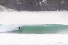 Keo Morrison stumbles across some school holiday fun at a remote beach break in the Catlins, New Zealand. Photo: Derek Morrison