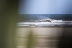 A wave breaks on a sand bank in strong winds in the Catlins, New Zealand. Photo: Derek Morrison