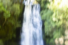 The McLean Falls on the Tautuku River in Catlins Forest Park descend a number of steep drop offs and terraces, with the very top of the waterfall, where it meets its first waterpool being 22-metres. McLean Falls in the Catlins, New Zealand. Photo: Derek Mo