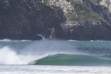 Keo Morrison making the most of a spring swell at a remote beach break on the Catlins coast, Otago, New Zealand. Photo: Derek Morrison