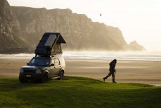 Photographer Rambo Estrada on the programme early during a spring swell at a remote beach break on the Catlins coast, Otago, New Zealand. Photo: Derek Morrison