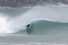 Eamon locked into a spring swell at a remote beach break on the Catlins coast, Otago, New Zealand. Photo: Derek Morrison