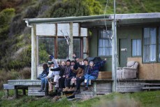 Stag partygoers at a remote beach break on the Catlins coast, Otago, New Zealand. Photo: Derek Morrison