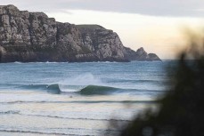 Spring lineup at a remote beach break on the Catlins coast, Otago, New Zealand. Photo: Derek Morrison