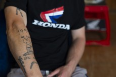 Pro rider Josiah Natzke, of Honda Motul Racing NZ Team, shows his tattoos ahead of the 2026 Yamaha New Zealand Motocross Championships at Moto Central near Huntly, Waikato, New Zealand. Photo: MNZ/Derek Morrison