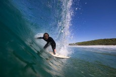 Jamie Paul slotted during a fun swell at Blackhead, Dunedin, New Zealand. Photo: Derek Morrison