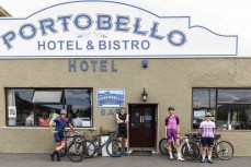 Cyclists (from left) Christopher Mills, Grayson Westgate, Sarah-Jayne Guest and Orla Dunlop at the Portobello Hotel during a ride around the Otago Harbour and Otago Peninsula in Dunedin, Otago, New Zealand. Photo: Derek Morrison