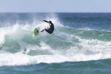 Lip ride during a fun swell at St Kilda, Dunedin, New Zealand.Photo: Derek Morrison