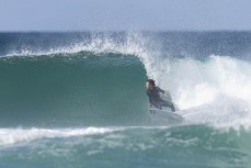 Jack Higgins on form during a fun swell at St Kilda, Dunedin, New Zealand.Photo: Derek Morrison