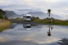 Reflections in floodwater at a surf break near Kaikoura, New Zealand. Photo: Derek Morrison