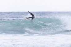 Chris Jenks makes the most of a small swell at Blackhead, Dunedin, New Zealand.