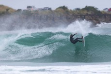 Keo Morrison making the most of a swell on the north coast of Dunedin, New Zealand.