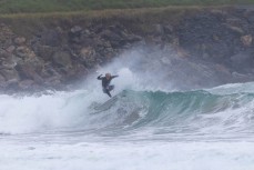 Keo Morrison making the most of a swell on the north coast of Dunedin, New Zealand.