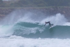 Fletcher Melville during a swell on the north coast of Dunedin, New Zealand.