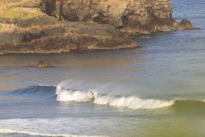 Keo Morrison makes the most of fun waves at Smaills Beach, Dunedin, New Zealand.Photo: Derek Morrison