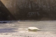 Dawn breaks at a remote beach break in the Catlins, New Zealand. Photo: Derek Morrison