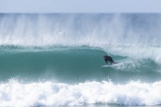 Keo Morrison gets barreled during a fun swell at St Kilda, Dunedin, New Zealand.Photo: Derek Morrison