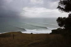 Lineup during a swell produced by Cyclone Gabrielle on the north coast of Dunedin, New Zealand.