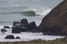 Lineup during a swell produced by Cyclone Gabrielle on the north coast of Dunedin, New Zealand.