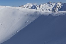 Eman and Marlee Silva drop into a fresh bowl at Ohau ski field, Ohau, Otago, New Zealand.