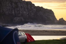 Dawn breaks at a remote beach break in the Catlins, New Zealand. Photo: Derek Morrison