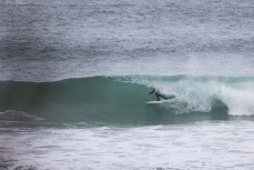 Slotted during a fun swell at Second Beach near St Clair, Dunedin, New Zealand.Photo: Derek Morrison