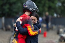 Cooper Young is hugged by his mum after making the podium in the last moto of the 15-16 Years 125cc class at the 2026 New Zealand Junior Motocross Championships held at the Brookhaven Motocross Training Facility in Leeston, Canterbury, New Zealand, April 1