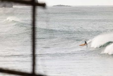 Jack Tyro makes the most of a fun swell at St Clair, Dunedin, New Zealand.