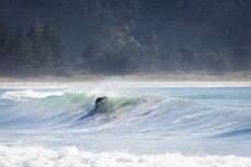 Keo Morrison knifing in during a swell on the north coast of Dunedin, New Zealand.