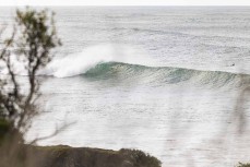 Sneaky left during a swell at St Clair, Dunedin, New Zealand.