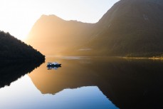 Dawn light during a tour exploring Doubtful Sound with Fiordland Expeditions Limited aboard the Tutoko II in Doubtful Sound, Fiordland, New Zealand. Photo: Derek Morrison