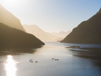Dawn light during a tour exploring Doubtful Sound with Fiordland Expeditions Limited aboard the Tutoko II in Doubtful Sound, Fiordland, New Zealand. Photo: Derek Morrison