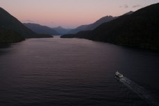 Evening light during a tour exploring Doubtful Sound with Fiordland Expeditions Limited aboard the Tutoko II in Doubtful Sound, Fiordland, New Zealand. Photo: Derek Morrison