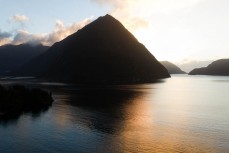 Stunning afternoon light in the mountains during a tour exploring Doubtful Sound with Fiordland Expeditions Limited aboard the Tutoko II in Doubtful Sound, Fiordland, New Zealand. Photo: Derek Morrison