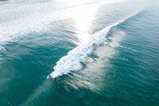 A surfer rides a wave at St Clair, Dunedin, New Zealand.