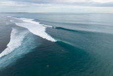 Lineup at a reefbreak in the Mentawai Islands, Sumatra, Indonesia.