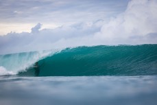 A surfer gets barrelled in the Mentawai Islands, Sumatra, Indonesia.