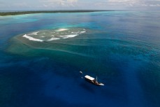 The Mahogany anchored in crystal clear water in the Mentawai Islands, Sumatra, Indonesia.
