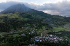 Abandoned village at the foot of Mount Sinabung (2460m) – an active stratovolcano consisting of andesite and dacite in the Karo plateau of Karo Regency, North Sumatra, Indonesia, 40 kilometres from Lake Toba. Many old lava flows are on its flanks and the