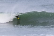Kahu Kaan making the most of a winter swell at a remote beachbreak near Dunedin, New Zealand.Photo: Derek Morrison